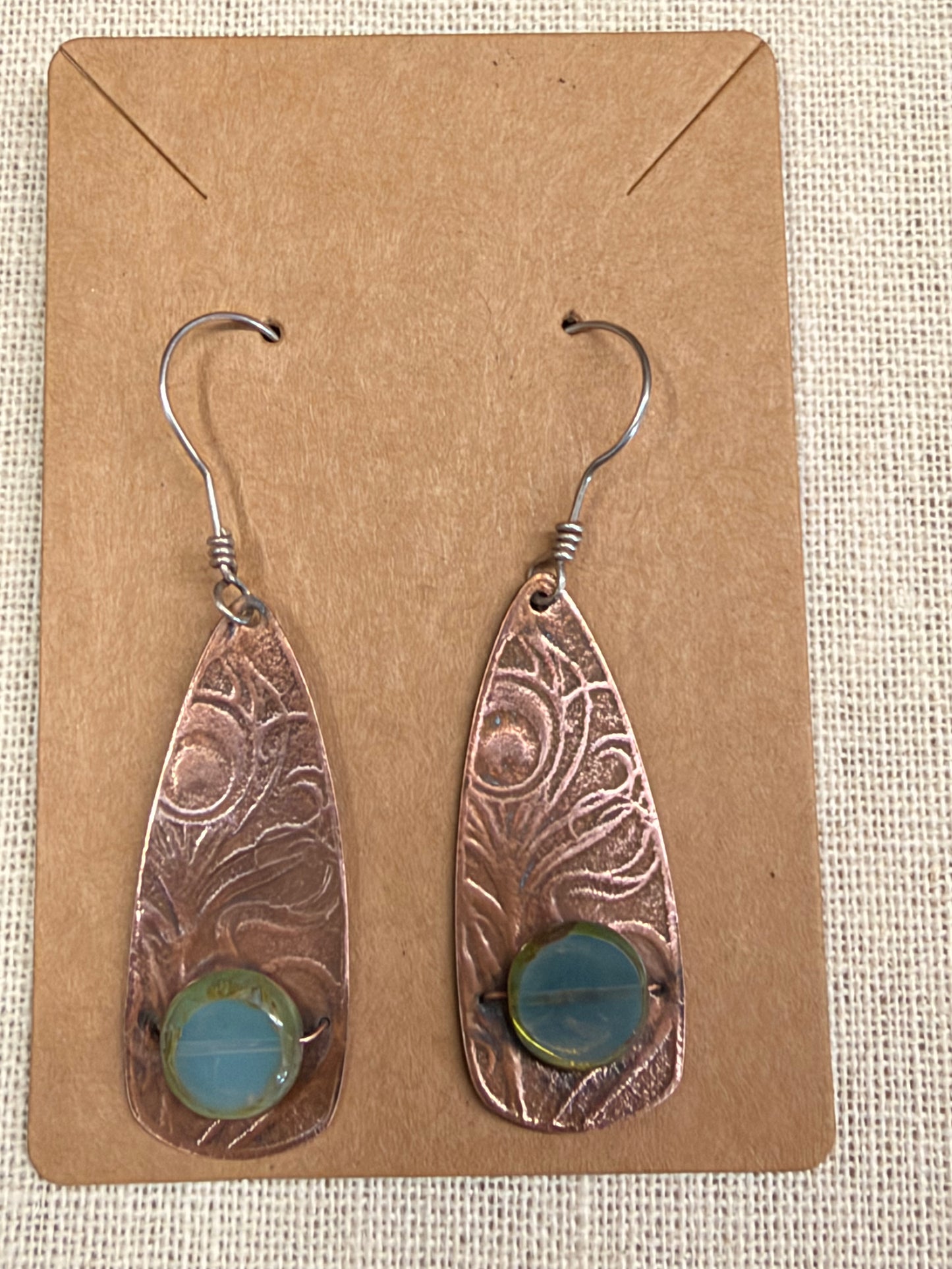 Earrings: Feather